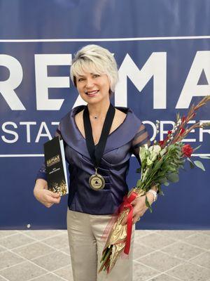 Receiving another Top Producer Award of ReMax International