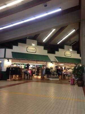 Second floor of airport, on both sides. This side is primarily clothing