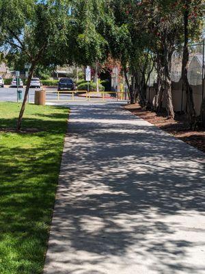 Walkway leading to the entrance of the parking lot