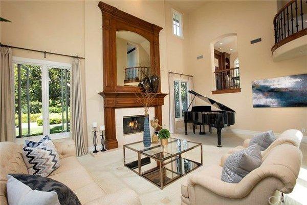 This living room is amazing. Look at that gorgeous piano.