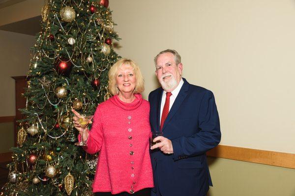 LKW past Chairmen Debra Andres and Ed Stewart at the holiday gala.