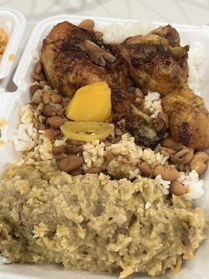 Grilled chicken, mashed plantain, rice and beans