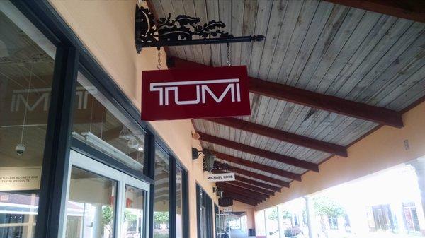 It doesn't say Tumi Leather for a reason.