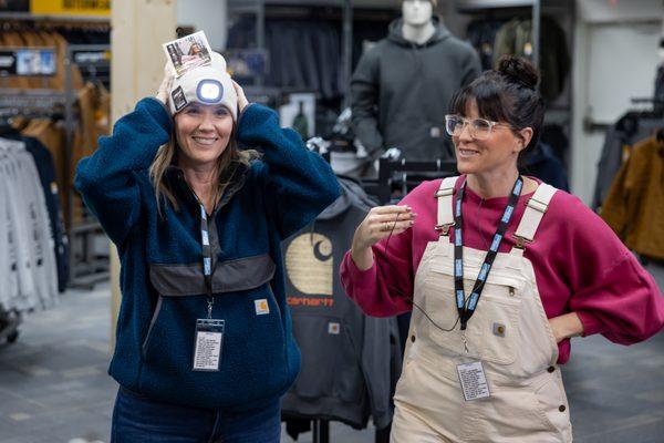 Leslie & Lyndsay trying on some clothing.