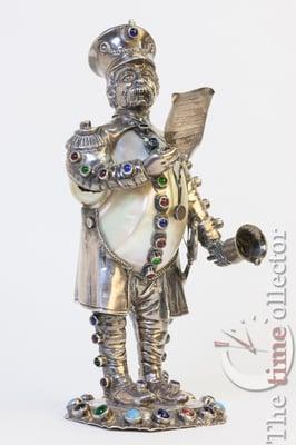 English Silver figurine with mother of pearl shell.