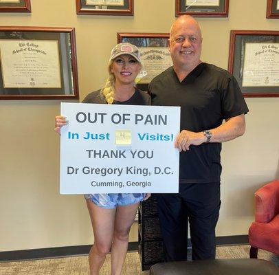 Dr. Gregory King with another happy patient