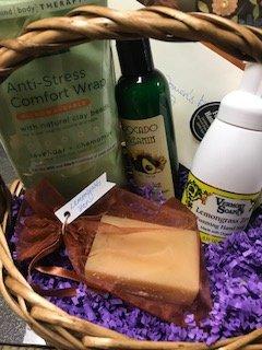 Another gift basket with a neck pillow and some organic goodies!