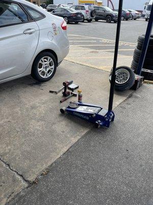 Mechanic trying to change nuts without changing tires. Busted!