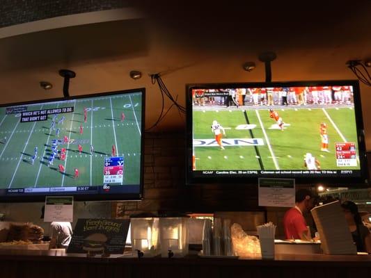 Lots of TVs with sports action