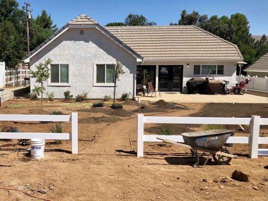 2 rail fencing separating my landscape and yard