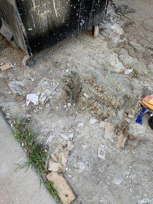 Cement and construction dirt left in the parking area