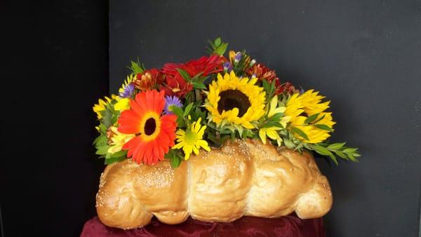 Order This centerpiece created from bread & we will donate $5 to the local food pantry in your name. 978-531-2288