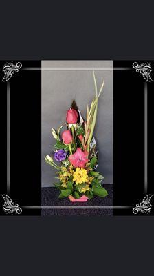 Warm their heart with a beautiful flower arrangement.