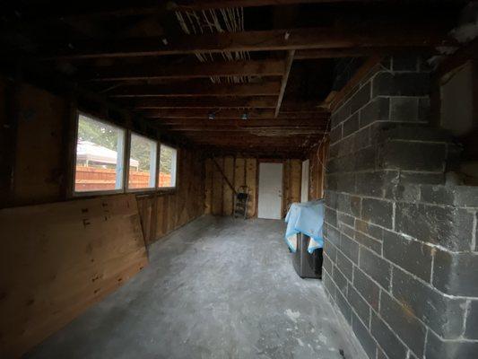 After.  A clean slate to refresh the garage with new insulation, sheetrock, and painting.