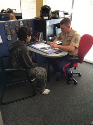 SSgt Brown providing some great information to an applicant.