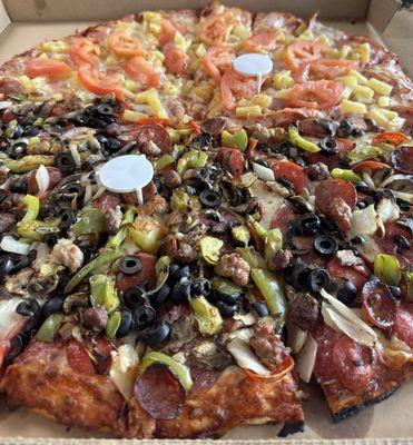 Mountain Pizza. Half Hawaiian, half combination.