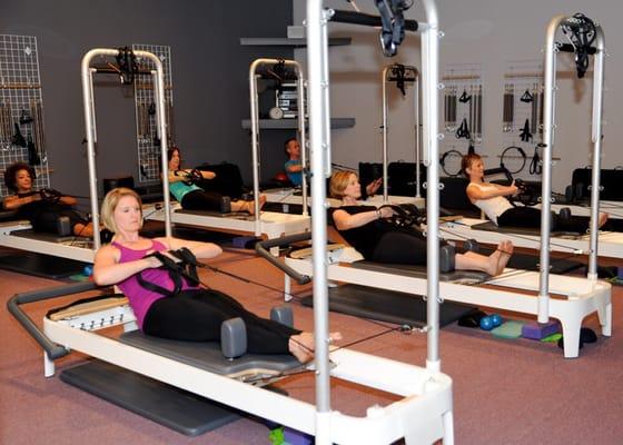 Build long, lean muscles using the reformer in classes up to 10 participants.