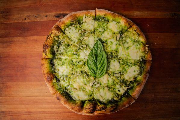 Francesco Pizza
Fresh basil pesto, mozzarella, grated parmigiano.