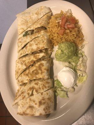 Grilled chicken quesadilla  With guacamole ,s.cream &rice.