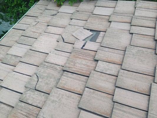 100's of broken tiles-  Said "Not their problem"