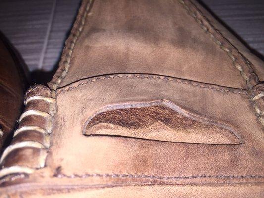 Ruined. The is no amount of "walking in the shoe" that can make the original color come back after being scraped off.