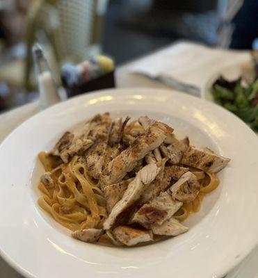 Fresh Fettucini in a creamy pink sauce with chicken