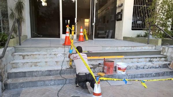 It's been a week since they began redoing the entrance...for the 3rd time. The front door has been Stuck open the entire time.