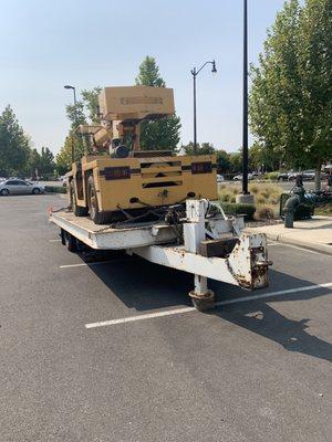 Large tow truck towed this over into a parking area of a closed business. It waited about a week and a half to get rescued.