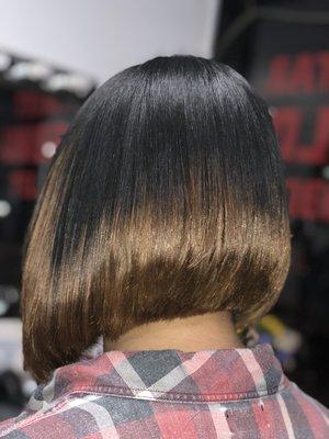 Asymmetrical bob and blonde tips