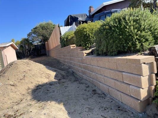 Retaining wall and fence