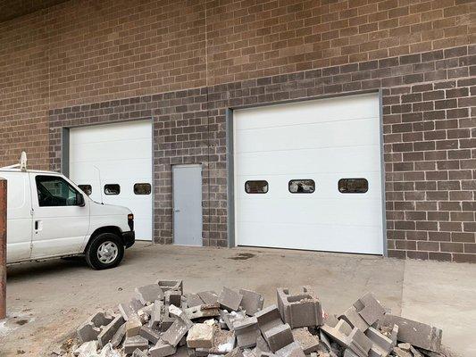 Breaking a wall to make garage doors