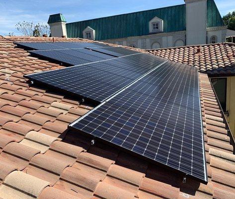 Solar system installation on a shingle roof