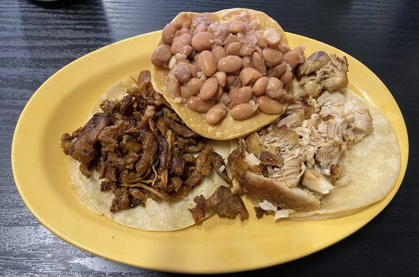 Al Pastor & Chicken tacos with a bean tosada