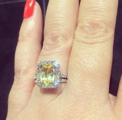 My beautiful custom made yellow sapphire and diamond engagement ring. Pictures do not do it justice.