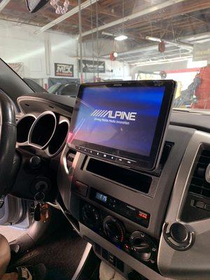 Alpine Halo 8" unit installed with metra dash kit in Tacoma