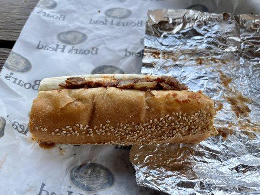 Cheesesteak with provolone, marinara, fried onions, on a fresh roll