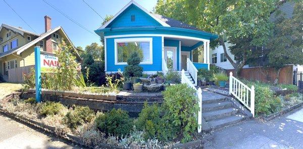 The beautiful front gardens create a zen entry to Boston Nails!