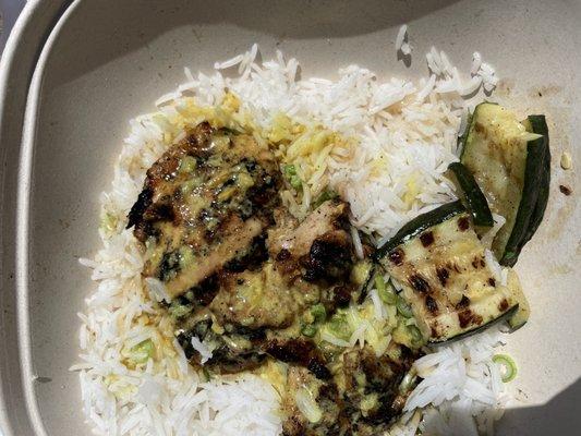 Grilled chicken with curry sauce, white rice & zucchini.