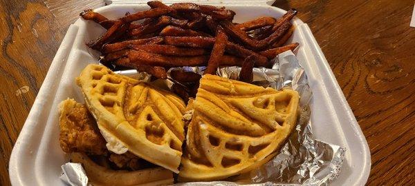 Chicken & Waffle Sandwich with sweet potato fries.