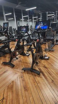 Peloton bikes amidst the cardio equipment