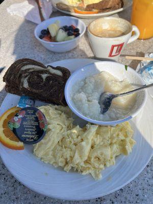 Eggs grits and fruit