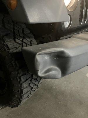 My Jeep bumper with the dent.