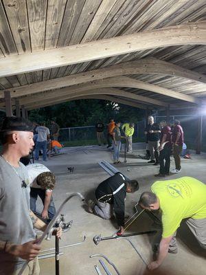 Apprentices learning pipe bending