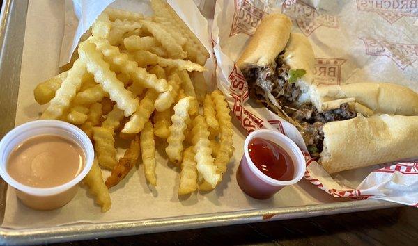 Medium crinkle fries and 7" Supreme Steak