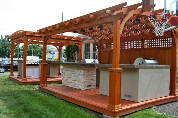 Wooden pergolas and outdoor kitchen islands are just a few of the products on display at Best in Backyards in Cheshire, CT.