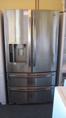 Stainless French Door Fridges have side by side fridge doors with a bottom freezer!