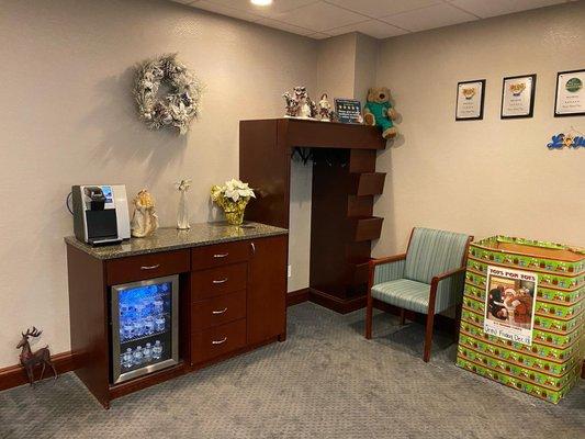 Reception area and refreshment station at Great Neck dentist Passes Dental Care