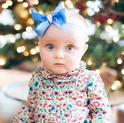 Super cute baby with a cute shirt.