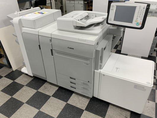 Canon ImagePress C750 - heavy duty machine for printing books, posters, and more! We also carry additional ImagePress models.