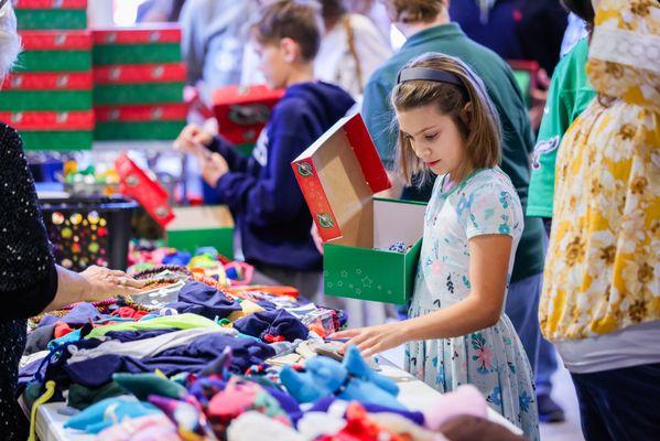 Each year, we pack hundreds of Operation Christmas Child shoeboxes, a wonderful mission project offering Christmas gifts to needy children